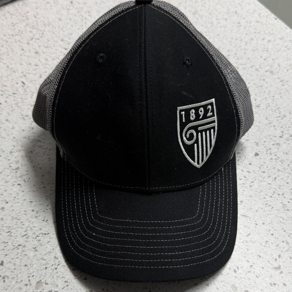 Strayer University Trucker Cap- gray and black with 1892 logo